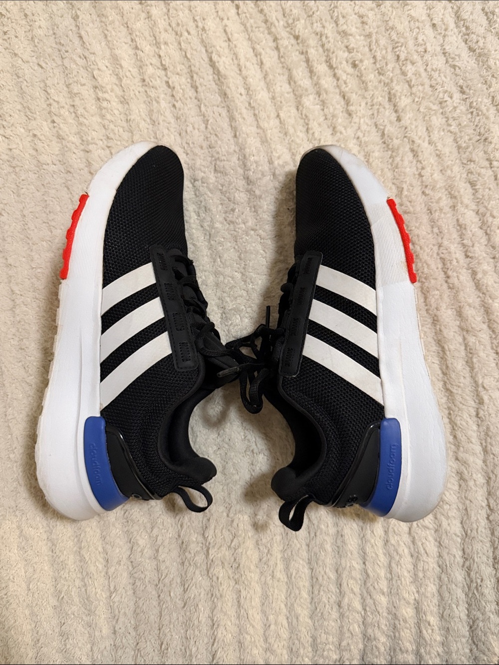 adidas Black Sneakers with White Stripes and Blue & Red Accents
